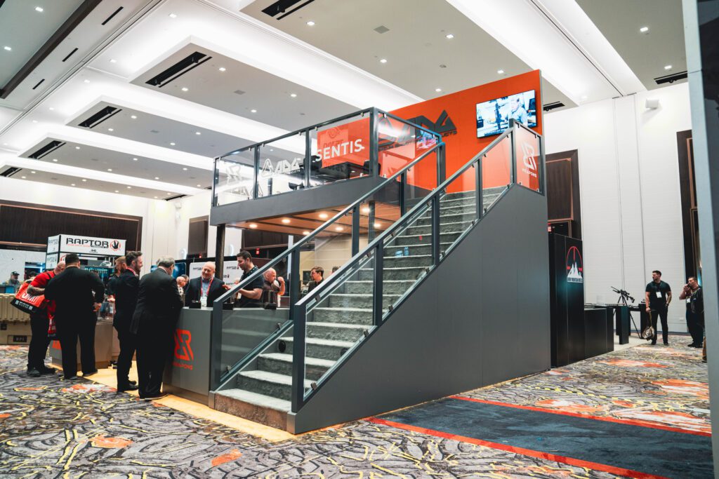 Two-level trade show booth with branding
