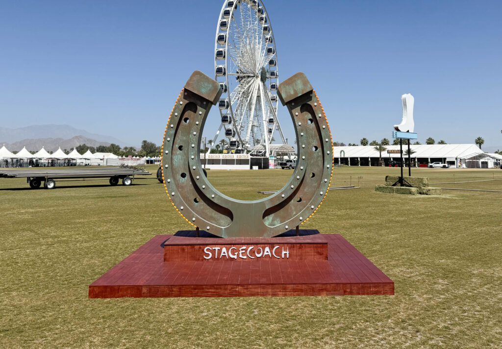 Outdoor sculpture exhibit on grass field
