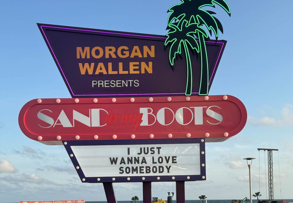 Sand in my Boots sign with palm trees