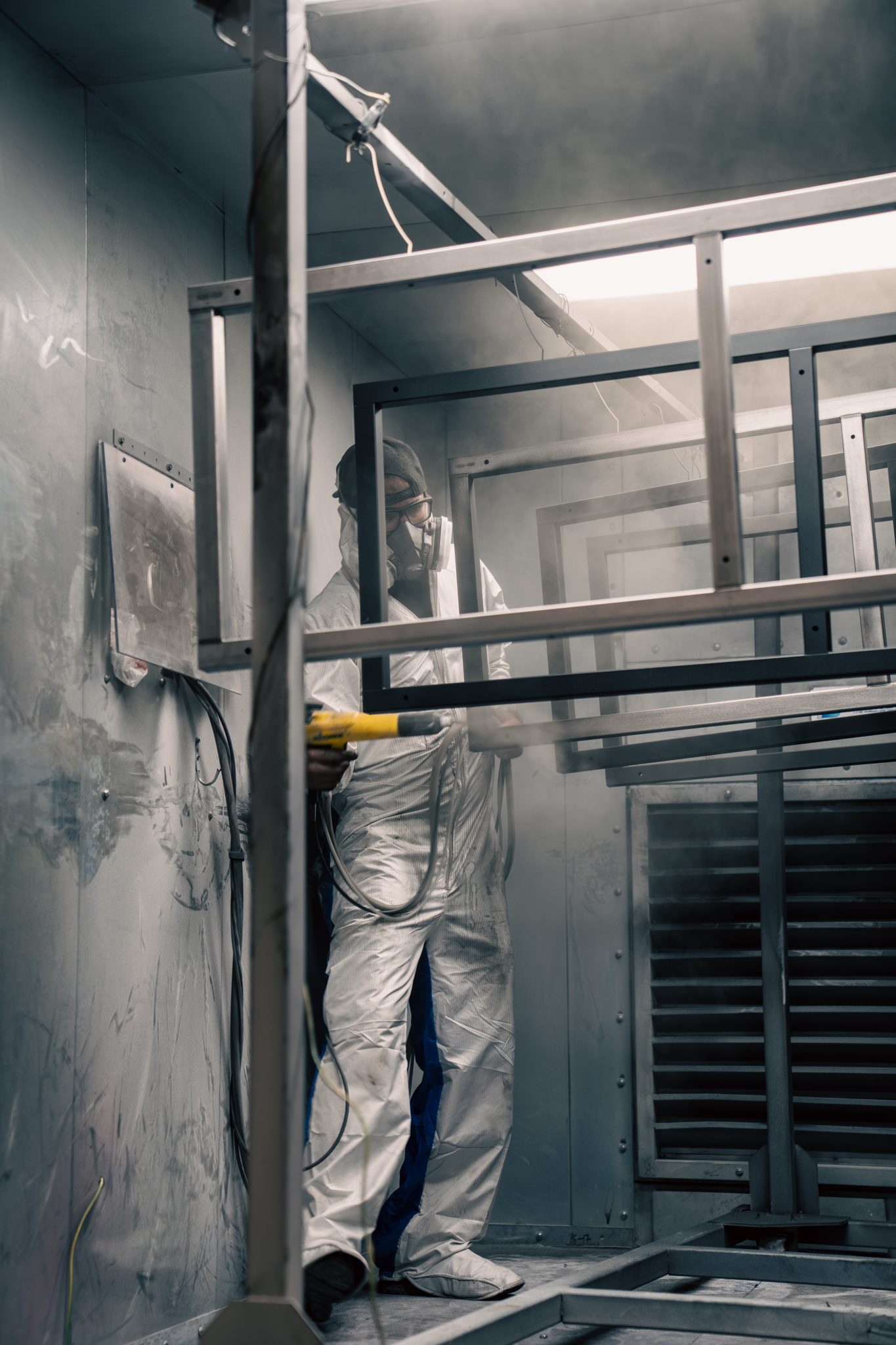 Electrostatic powder application on custom steel framework