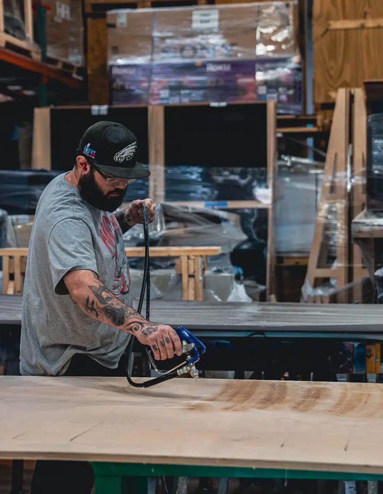 Refinishing a stored exhibit panel between shows at Steadfast Displays