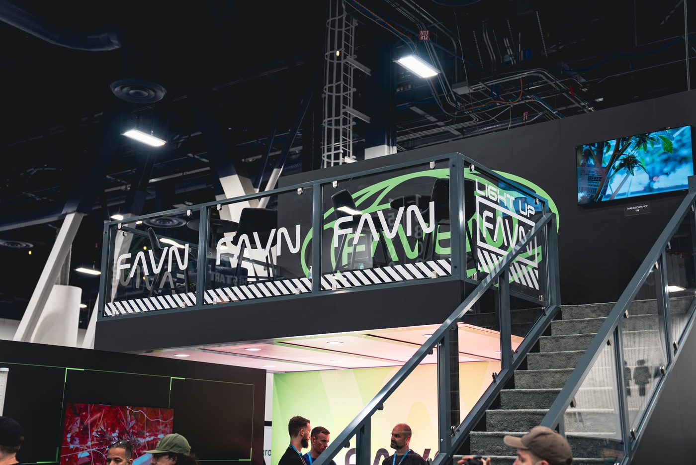 Faven two-story double deck trade show booth built by Steadfast Displays